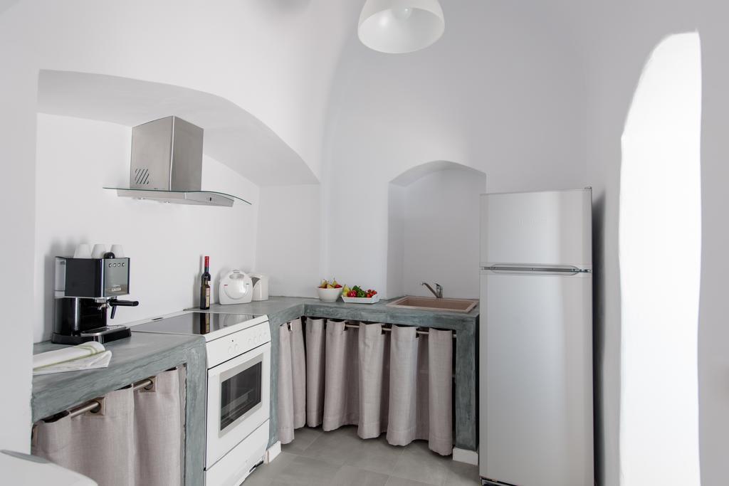 Evmenia Luxury Cave Villa Oía Quarto foto